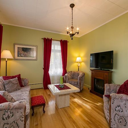 Auberge Gite Maison Des Lilas La Malbaie Quarto foto