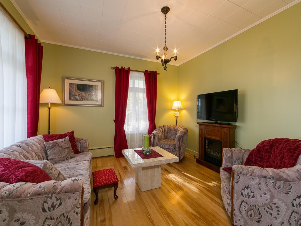 Auberge Gite Maison Des Lilas La Malbaie Quarto foto